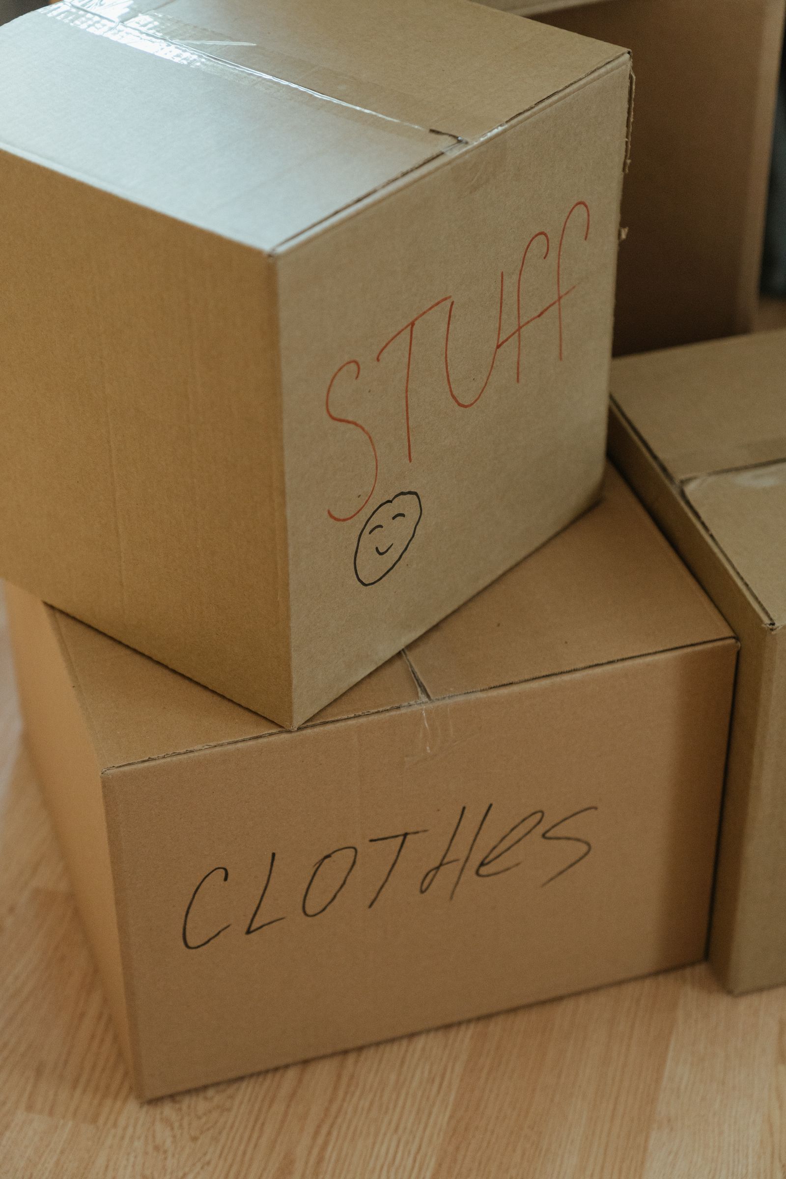 Labelled moving boxes packed ahead of moving day